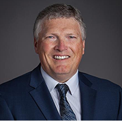 Headshot of John Strickland